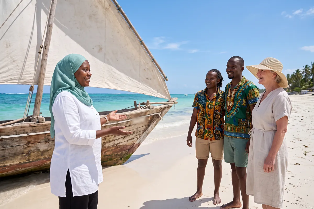 Tour operator in Malindi welcoming guests to a dhow trip on the beach